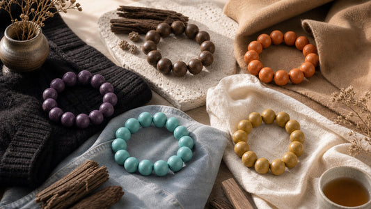 Five Elements aromatic bracelets styled with neutral wardrobe fabrics and natural materials